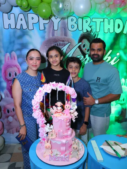 A lovely family portrait from the Labubu-themed celebration. Our party setups provide the perfect backdrop for capturing these precious memories.