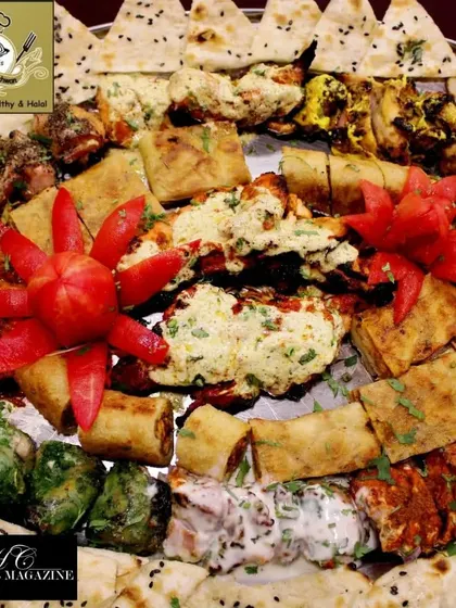 This platter shows the variety I offer. You get creamy starters, crispy rolls, and smoky kebabs all in one place, garnished and ready to serve. It's a feast for the eyes and the stomach.