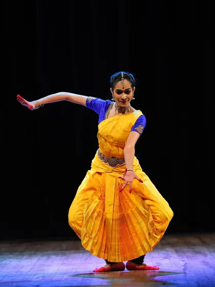 The quintessential Aramandi posture, demonstrating the geometric precision and groundedness that is a hallmark of the Pandanallur style of Bharatanatyam.
