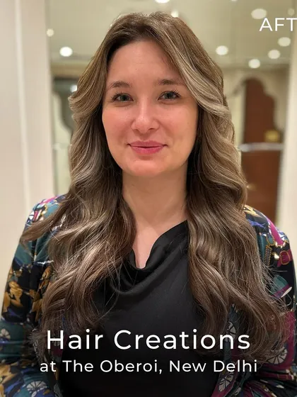 The beautiful after-shot of a cool ash colour transformation. The long layers and Hollywood waves perfectly complement the new, sophisticated shade.
