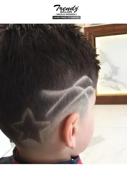 A fun star design for one of our youngest clients. We make sure every haircut is a gentle and positive experience.
