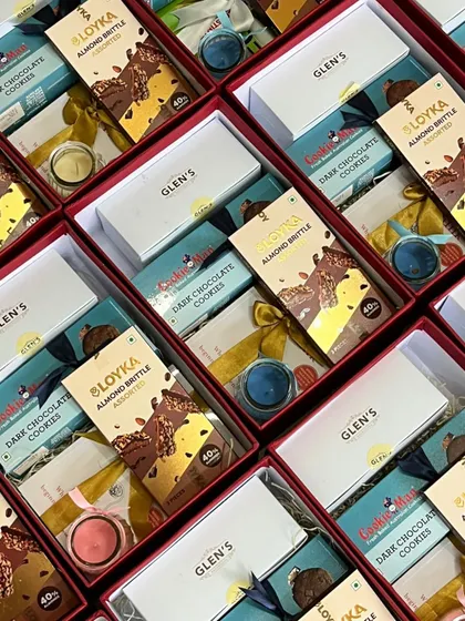 Another view of our corporate snack boxes, showing the neat arrangement of gourmet treats that are perfect for client or employee appreciation gifts.