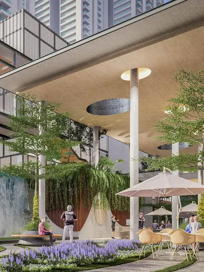 A conceptual rendering of the Myhome Vipina Clubhouse, showing a large waterfall feature and outdoor seating. Our vision was to create a dynamic social space where architecture and nature are one.
