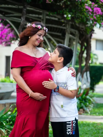 A touching moment between a mother-to-be and her son, who is about to become a big brother. Outdoor sessions like this are perfect for capturing the evolving story of a growing family.