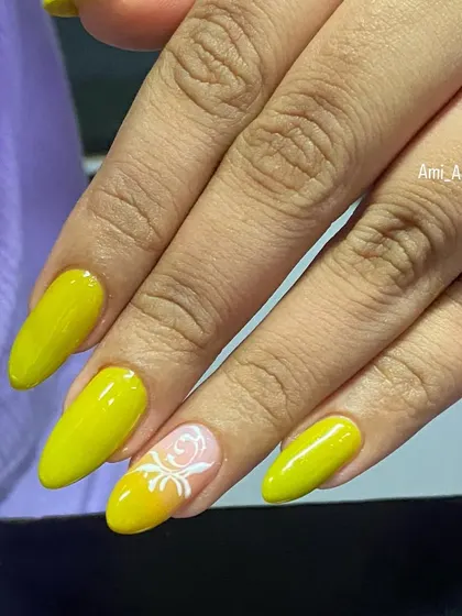 A beautiful swirl art design on a vibrant yellow base. This is a great technique for adding movement and elegance.
