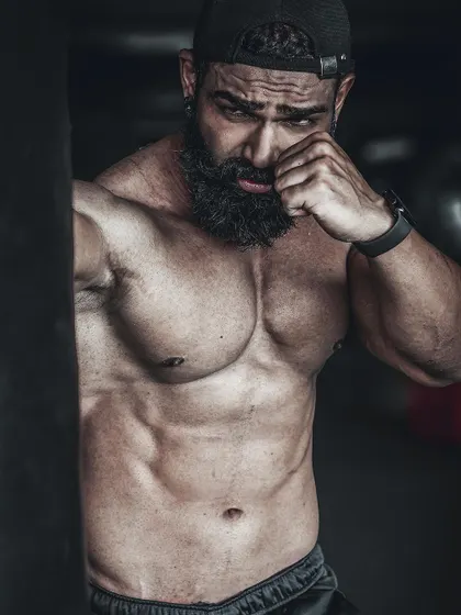 Close up and intense. Self motivation is the only thing that lasts. This shot captures the focus and determination required to succeed in fitness and in life.
