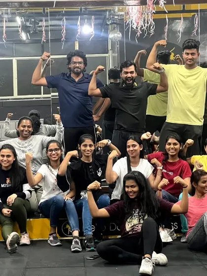 Our Bollywood session crew showing off their muscles after a great workout.