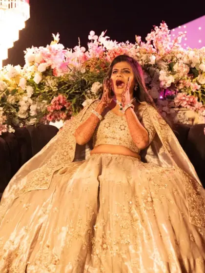 A fun, candid moment from the sangeet stage. The makeup and hair held up perfectly through all the dancing and excitement.