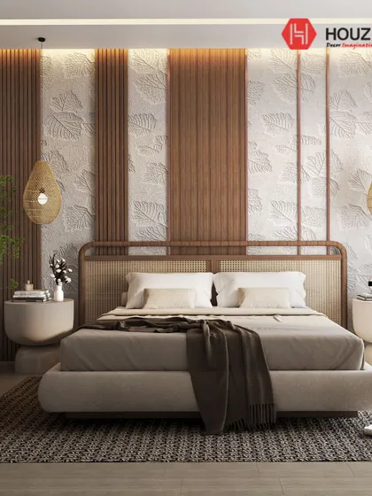 This image of a bedroom with a rattan headboard and textured wall is repeated to highlight the popular trend of using natural and sustainable materials in modern interior design.