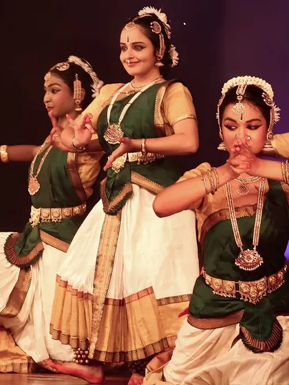 The elegance of the dancers' movements and costumes.