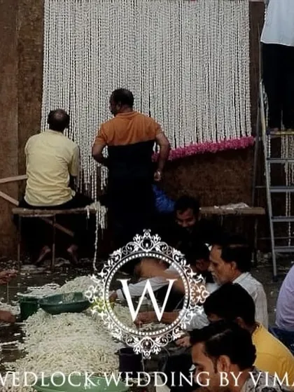A behind-the-scenes look at our dedicated team at work. We worked day and night for six days to bring the vision for this half-saree function to life, from crafting floral garlands to setting up the grand stage.