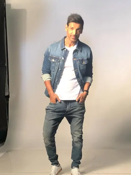 A classic and cool look I styled for John Abraham. The simple combination of a white t-shirt and a well-fitted denim jacket is timeless and showcases how I create effortless style for celebrity shoots.