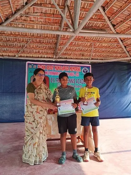 Our student Ishaan B and his partner receiving their awards after becoming the All India Tennis Association (AITA) U-14 Doubles Runner-Up in Chittor, AP.