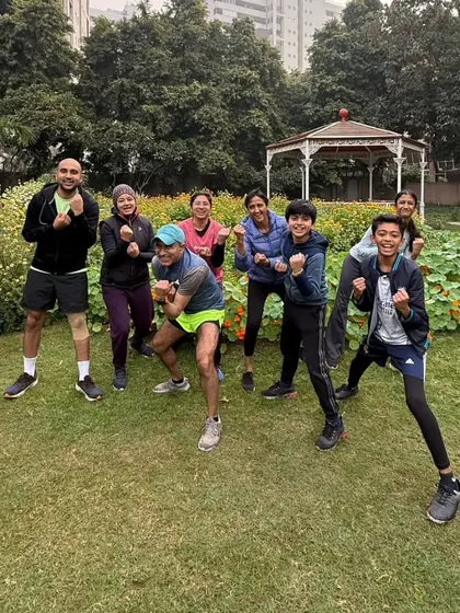 The tribe in a group pose during a training session. The focus and determination are clear.