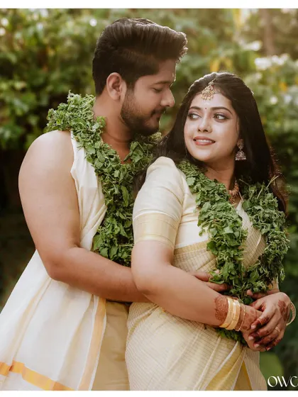 The sanctity and beauty of a traditional temple wedding. We capture the deep connection between the couple amidst the sacred atmosphere, highlighting the cultural richness of a Kerala wedding.
