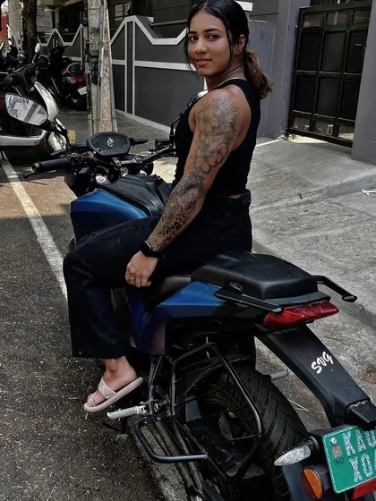 A candid shot on my bike. It's about living a life of strength and freedom.