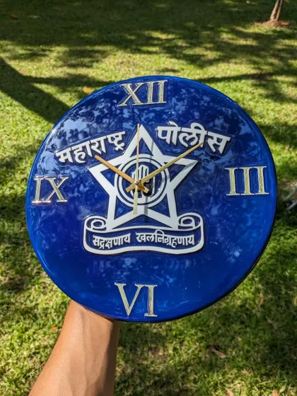As a token of gratitude, I created this custom 12-inch wall clock for the Maharashtra Police. The design incorporates their official logo in white and silver acrylic, set against a deep blue resin background.