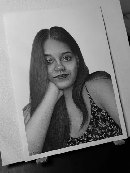 A beautiful solo portrait commission from Jharkhand. I used Brustro A4 paper and graphic pencils to create this realistic sketch, paying close attention to the hair and expression.