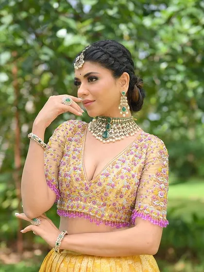Another angle of this elegant half saree, perfect for a bride or bridesmaid looking for a unique color combination.