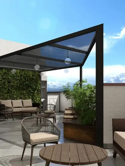 This penthouse terrace is an urban oasis, designed for relaxation and entertaining. It features comfortable outdoor seating under a modern pergola, surrounded by vertical gardens and planters that bring greenery to the cityscape.