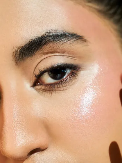 A macro shot showing the texture of the skin. My student Drishika achieved a finish that looks like real skin, with a stunning highlight on the cheekbone.
