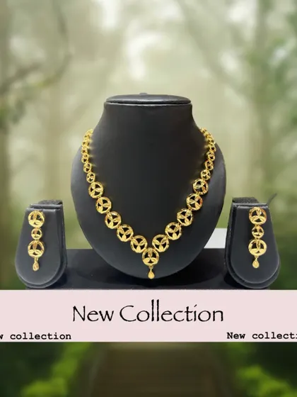 A new collection piece, this simple 1-gram gold plated necklace set has a unique circular design. It is lightweight and perfect for daily or office wear.