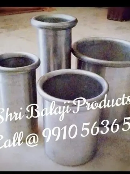 A collection of my sturdy aluminum pillar molds. These are a long-lasting investment for any serious candle maker, providing smooth, perfect pillars every time.