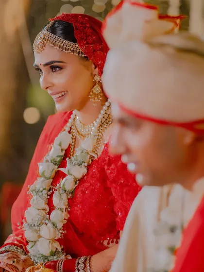 A candid moment from Aashna’s wedding ceremony. Her makeup was kept soft and romantic to match the intimate and joyous atmosphere.