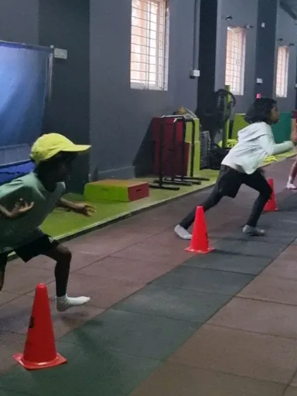 Young athletes performing cone drills to improve their change-of-direction speed and coordination.
