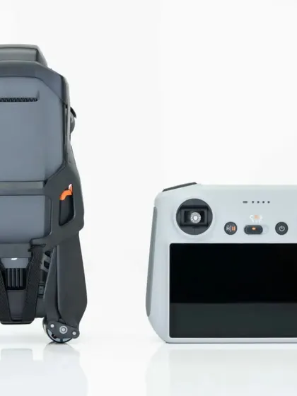 The DJI Mavic 3 drone in its compact, folded state next to the smart controller. This professional setup is portable and efficient, allowing for quick deployment at event locations across Bengaluru.