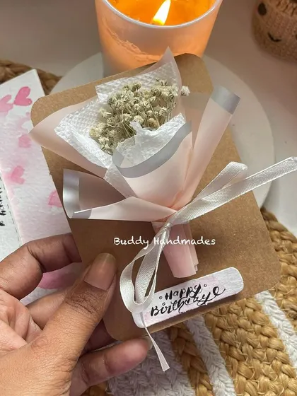 This birthday hamper includes a super cute mini bouquet made with dried baby's breath, attached to a custom "Happy Birthday" card.