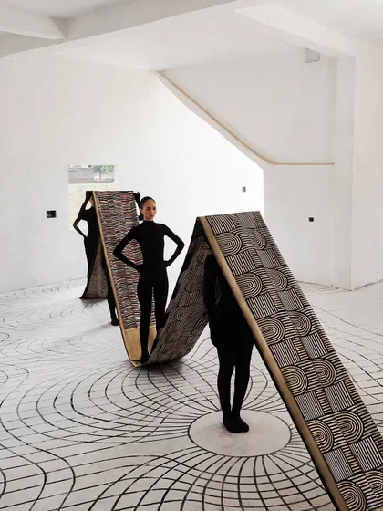 This shot from 'The Line' series for Shanti Banaras shows my conceptual approach to styling. We used models in minimalist catsuits to interact with textile installations, turning the fabric itself into a sculptural and architectural element of the story.