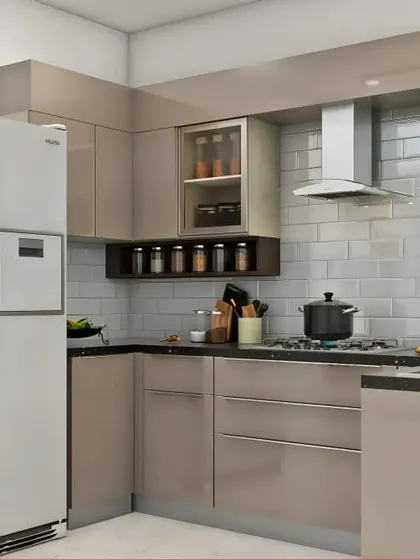 This practical L-shaped kitchen design in a neutral beige tone is perfect for everyday use. It features a mix of open and closed shelving for spices and essentials, ensuring everything is within easy reach while cooking.