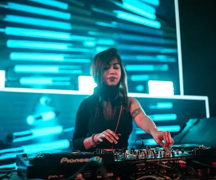 A cool, blue-lit shot from my set at The Lalit Bangalore. The lighting and visuals are essential for creating that immersive, otherworldly feel.