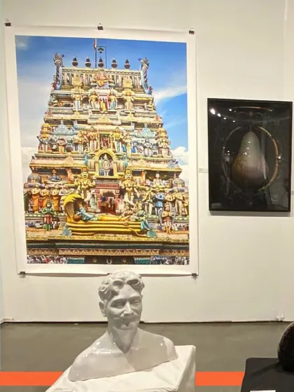 A highlight from a past edition of the Seattle Art Fair, featuring a large photograph and a sculpture.