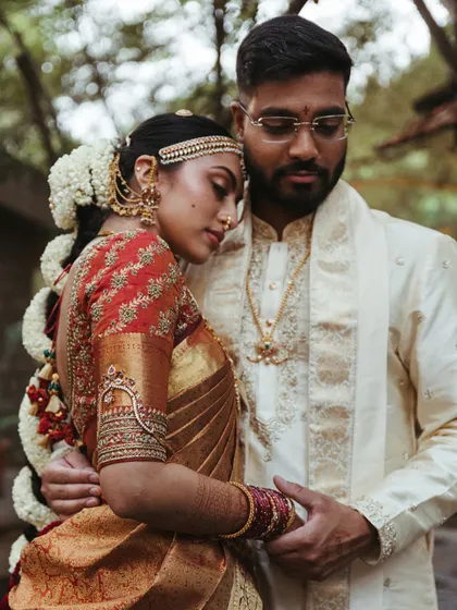 An intimate embrace between the bride and groom. Our focus is on creating a comfortable atmosphere where couples can be themselves, allowing for natural and heartfelt moments to be captured.