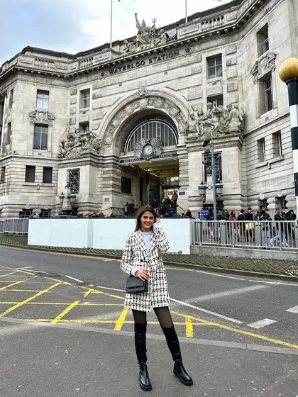 In front of the historic Waterloo Station in London. This outfit proves that you can be comfortable enough for travel and stylish enough for photos at the same time.