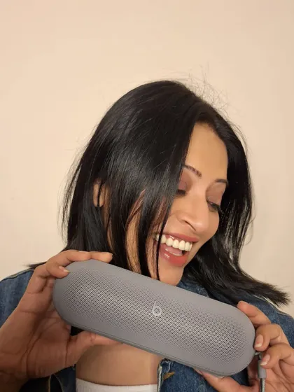 A joyful shot with the Beats Pill speaker. I love showcasing how tech products can also be stylish accessories that bring happiness.
