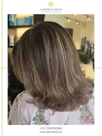 A side view of the mushroom blonde highlights, showing the subtle layers and cool, earthy tones of the color.