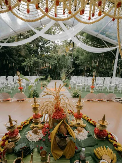 A duplicate of 210, showing the detailed ceremony setup on the mandap stage, ready for the rituals to begin.