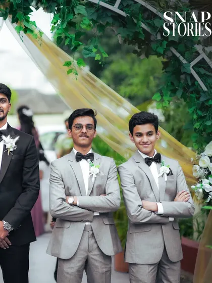 The groomsmen looking sharp in their matching suits. We also capture stylish portraits of the wedding party.