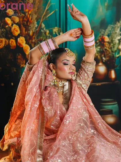 An elegant Eid-inspired look with a soft pink color palette, showcasing skills in creating festive and culturally specific makeup.