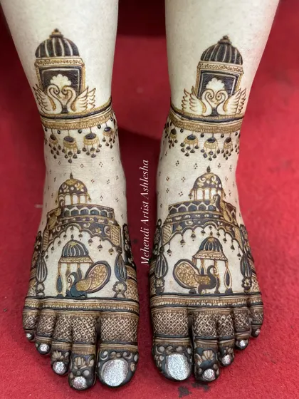 Another view of the royal bridal feet design, showing the intricate details of the palanquins and swans. The craftsmanship is evident in every line.