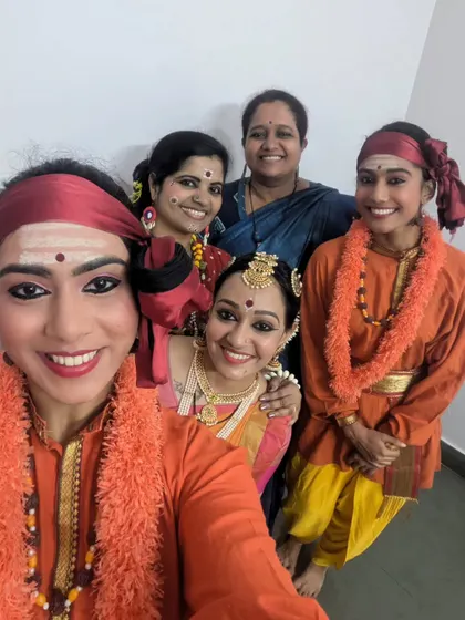 Celebrating an award for my research paper with my students who performed with me. Research is never individual work; it's an assimilation of knowledge from gurus, scholars, and the artists I work with.