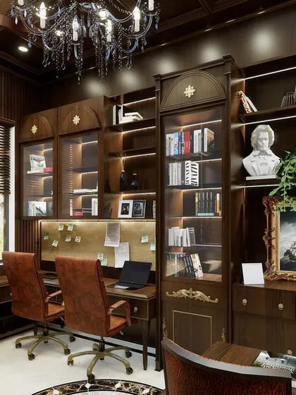 The enduring beauty of classical design is on full display in this home office. Rich wood paneling, a grand chandelier, and traditional furniture create a timeless and scholarly atmosphere.