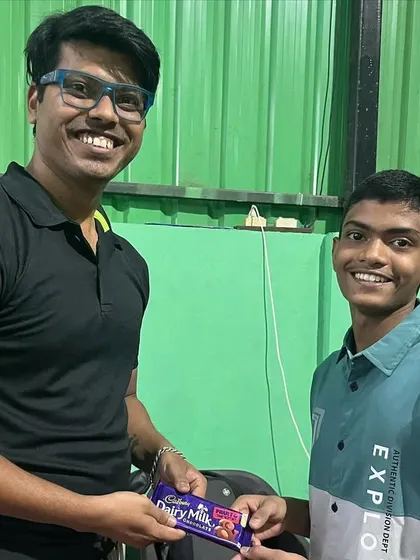 Sharing a moment with one of our players during the anniversary celebration. These relationships are what make our academy a true family.
