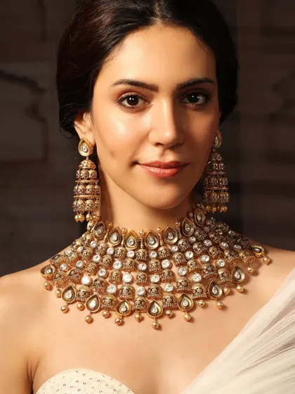 A product shot of the stunning all-polki choker and matching tiered jhumkas from the Pashmina Roshan shoot.