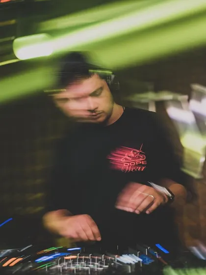 A motion blur shot capturing the fast-paced energy of a club night. I'm always moving, always mixing, and always in the zone.