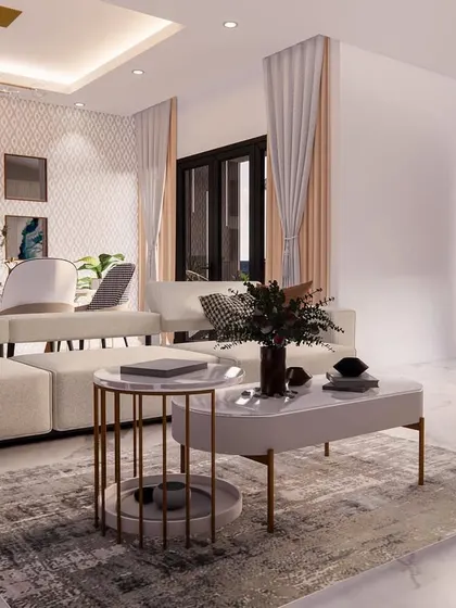 A wide shot of the 'Eleganza' living and dining space, showcasing the balance of neutral tones, textures, and elegant furniture.