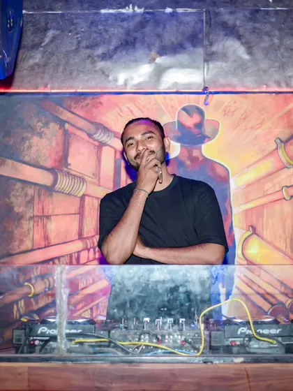 A moment of thought behind the decks. Happy faces in the crowd always encourage me to experiment and create new moments.